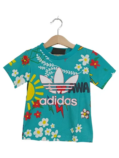 adidas x Pharrell Williams Kinder T-Shirt Blumenmuster Gr. 92 Türkis