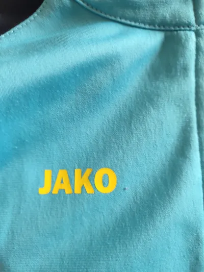 JAKO Trainingsjacke Kinder Gr. 140 Blau Sportlich Kapuze Reißverschluss