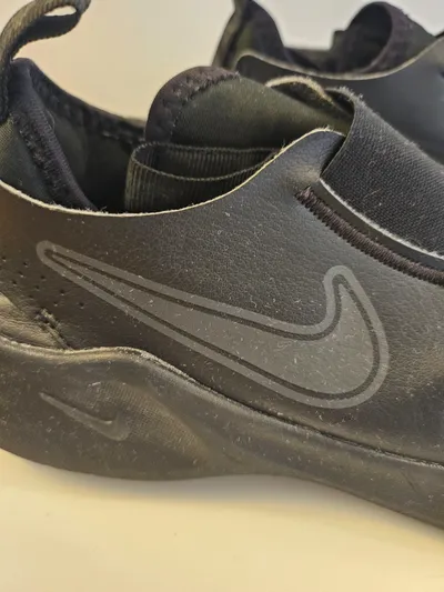 Nike Kinder Sneaker Low Schwarz Slip-On Sportschuhe Gr. 36