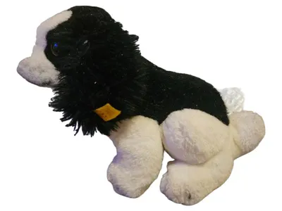 Steiff Cockie Cocker Spaniel Plüschtier Hund schwarz weiß Knopf im Ohr