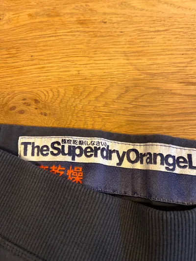 Superdry Damen Jogginghose Orange Label Capri Blau Gr. S 36