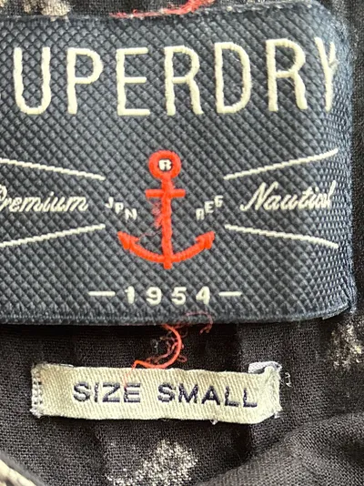 Superdry Damen Minirock Blumenmuster Schwarz Knopfleiste Gr. S