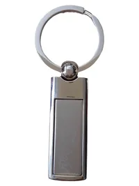 Coca-Cola Schlüsselanhänger Logo Silber Metall 8cm Modern Gebraucht 1