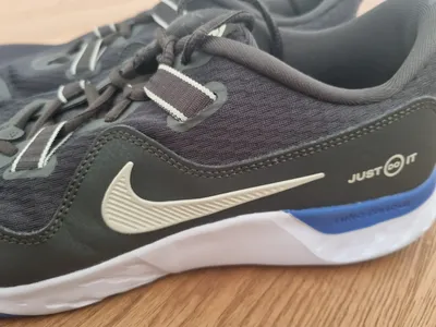 Nike Renew Retaliation Herren Laufschuhe Sportschuhe Grau Gr. 46