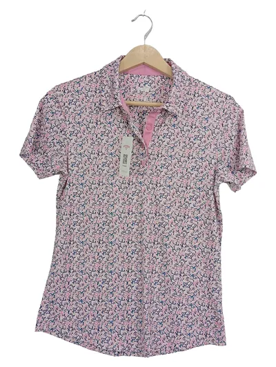 PUMA Damen Poloshirt Gr. 34 XS Mehrfarbig Blumenmuster Sportlich Kurzarm