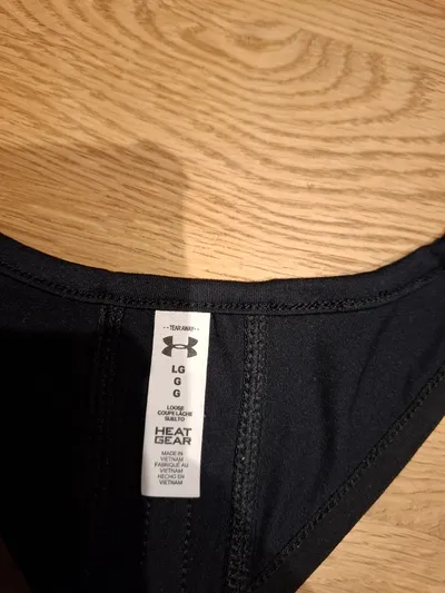 Under Armour Damen Tanktop Sporttop HeatGear Racerback Schwarz Gr. L