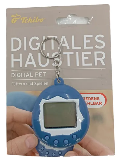 Tchibo Digitales Haustier Tamagotchi Schlüsselanhänger Blau Digital Pet