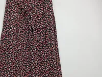 ever.me Damen Faltenrock Blumenmuster Schleife Midirock Schwarz XS 2