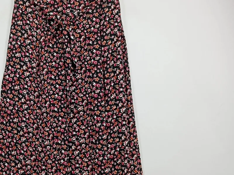 ever.me Damen Faltenrock Blumenmuster Schleife Midirock Schwarz XS 2