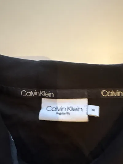 Calvin Klein Herren Langarm Poloshirt Schwarz Logo-Print Gr. M
